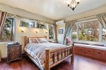 Rest easy in this dreamy master suite on the main level of the home